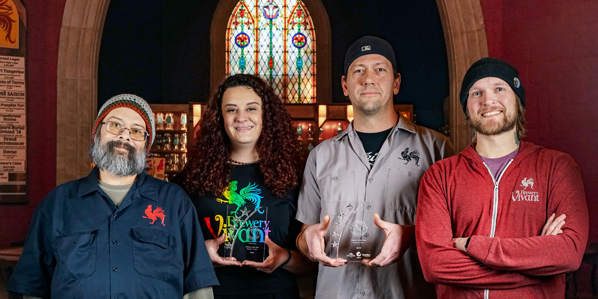 brewery vivant employees holding awards